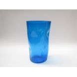 A large art glass tumbler vase, probably Swedish, in blue with dimple detail, 29.