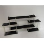 A three tier acrylic display stand,