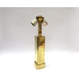 A brassed table lamp of stepped squared form,