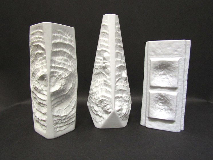 Two AK Kaiser porcelain white matte vases with fossil relief texture detail,