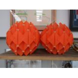A pair of 1970's orange plastic woven design lamp shades,