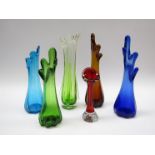 A group of six bud vases in various colours,