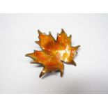 A mid to late 20th Century silver and enamel naturalistic leaf brooch in amber tones by Hroar Prydz