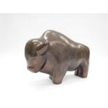 A West German figure of a Bison in bronzed colour glaze, 21cm x 29.