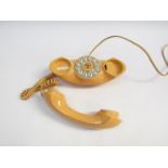 An orange "Genie" telephone
