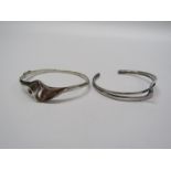 A modernist Lapponia style silver bangle and another similar silver bangle