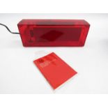 A Habitat LED clock in a rectangular red transparent plastic casing