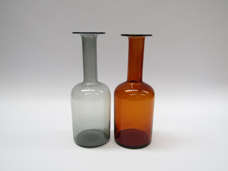 A Holmegaard amber glass Gulvase by Otto Brauer and a similar smoked glass vase.