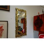 A gold Syroco brutalist mirror 1970's made in USA,