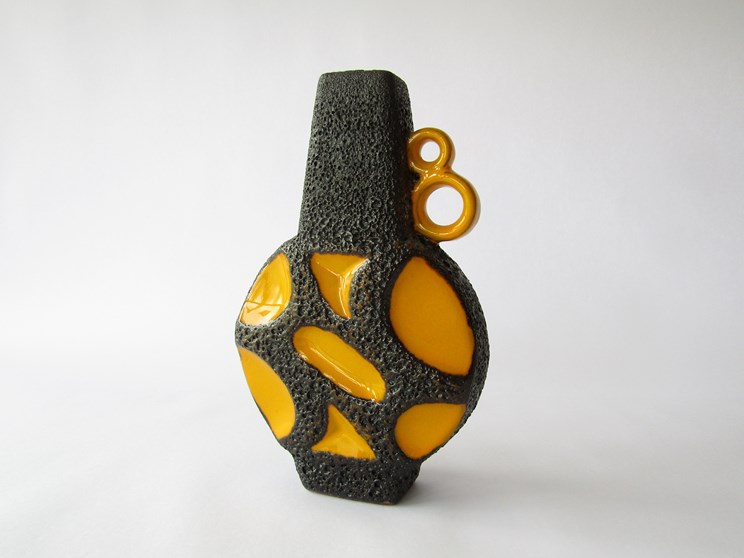 A Roth Keramik Fat Lava vase with double loop handles in yellow and black glazes. Marked 'W.