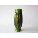 A Poole Delphis green and ochre vase c1970. Shape 15, monogram to the base. 22.
