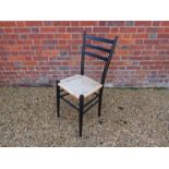 A black painted chair,