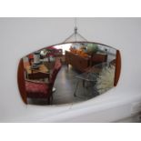 A Teak mounted wall mirror, 65cm x 38.