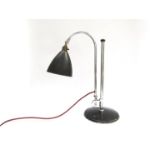 A "Bestlite" table lamp by Robert Dudley Best in chrome and black