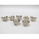 Seven Danish silver plated candle holders,