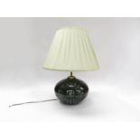 A Lotus Pottery table lamp with floral detail, later shade,