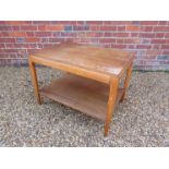 A 1940's stained beech two tiered occasional table.