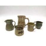 DAVID LEACH (1911-2005) A small olive glazed mug, a Lowerdown foxglove jug and two St Ives jugs,