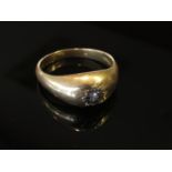 An 18ct gold ring with diamond chip in illusion setting, size S, 6.