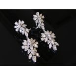 A pair of white gold encrusted double drop floral earrings, bespoke made, 4.