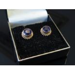 A pair of amethyst stud earrings,