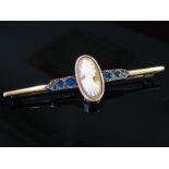 A cameo and marcasite paste bar brooch