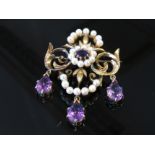 A 9ct gold pearl and amethyst brooch hung with three amethyst droplets