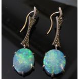 A pair of opal drop earrings