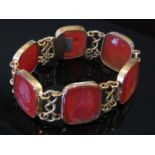 A six panel cornelian intaglio bracelet each panel depicting a bust of a gentleman,