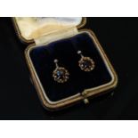 A pair of 9ct gold garnet drop earrings,