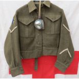 A WWII British Army battledress blouse dated 1945,