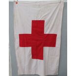 A WWII style Red Cross flag. Buyer to determine age.