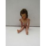 A small articulated 1940's doll with fashion hair