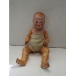 An early 20th Century Armand Marseille bisque headed baby doll,