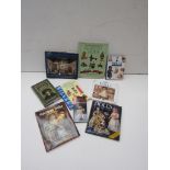 Assorted doll and toy collecting books including Millers