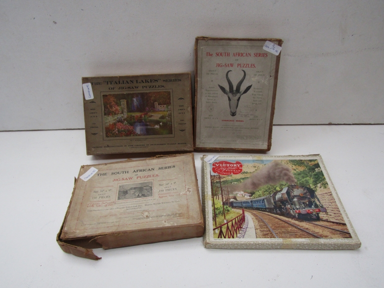 Four wooden jigsaw puzzles including "The South African Series" and "Victory"