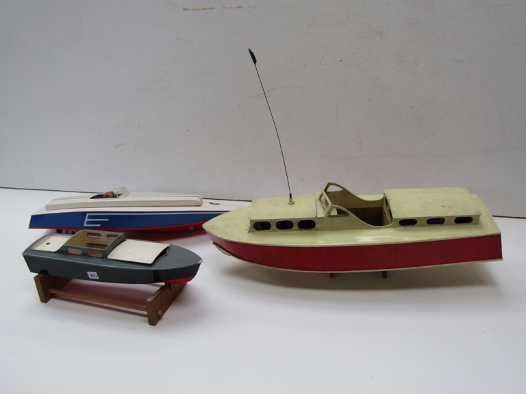 Three wooden model launches,