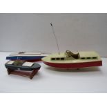 Three wooden model launches,