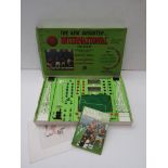 A boxed 1970's Subbuteo 'International' set complete with teams, photographers,