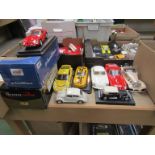 Eight large scale diecast cars including Burago and two boxed examples