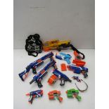 A collection of Nerf guns,