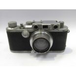 A Leica III rangefinder camera circa 1936, chrome, serial number 197618,