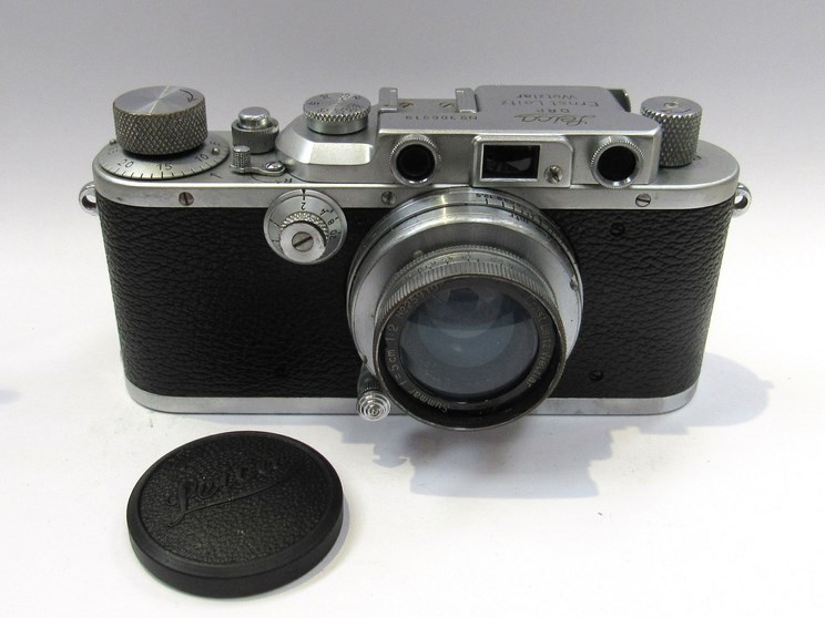 A Leica III rangefinder camera circa 1938, chrome, serial number 306919,