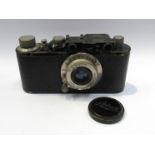 A Leica I rangefinder camera circa 1931, black, serial number 63758, with Leitz Elmar 50mm 1:3.