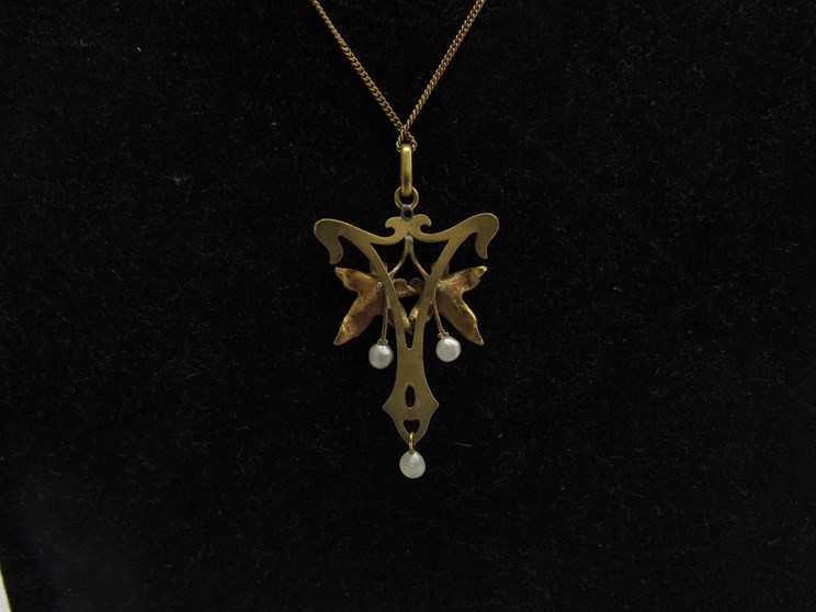 A 19th Century Art Nouveau pendant on chain, set with ruby, pearl and diamond, unmarked, - Image 2 of 2