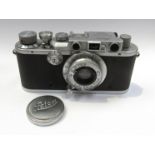 A Leica III rangefinder camera circa 1935, chrome, serial number 154933, with Leitz Elmar 50mm 1:3.