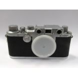 A Leica IIIc rangefinder camera body circa 1949, chrome, serial number 471778.