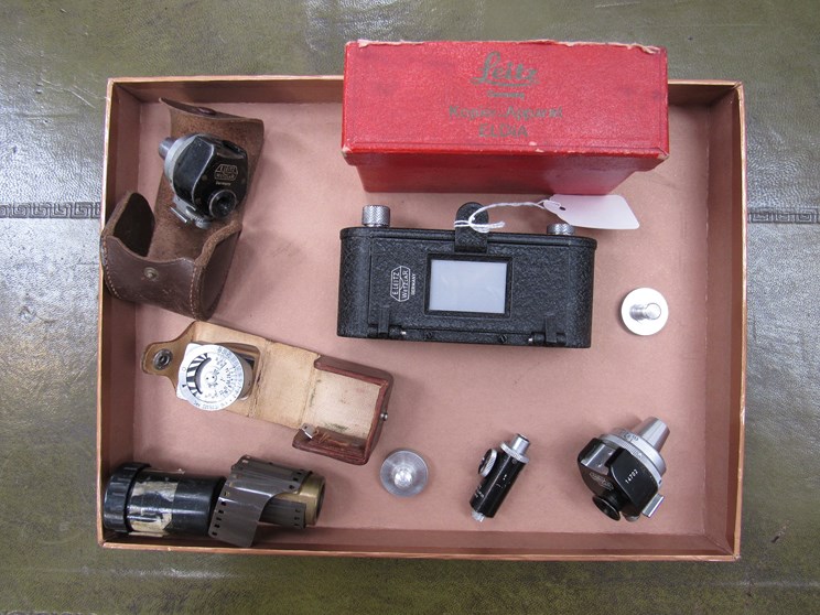 A quantity of Leitz and other camera equipment including film copier and viewfinder.