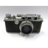 A Leica III rangefinder camera circa 1937, chrome, serial number 223144,