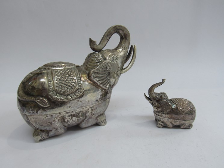 Two Cambodian white metal elephant form trinket pots